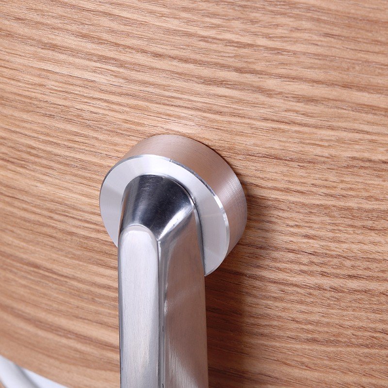 Close-up of the round handle on the Eames lounge chair ottoman