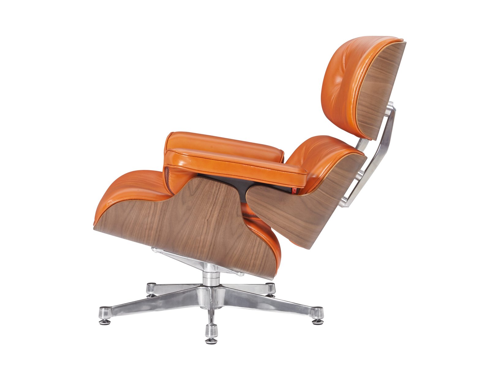 Left side view of the standalone eames lounge chair camel leather resting on an aluminum base.