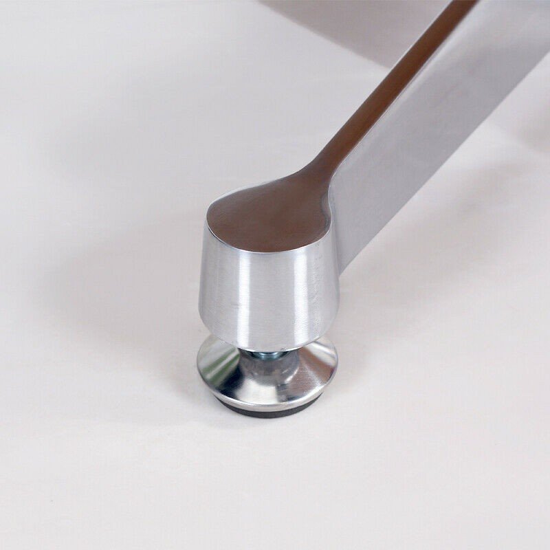 Close up of the swivel mechanism and lever hardware on the chrome base of the white eames chair.