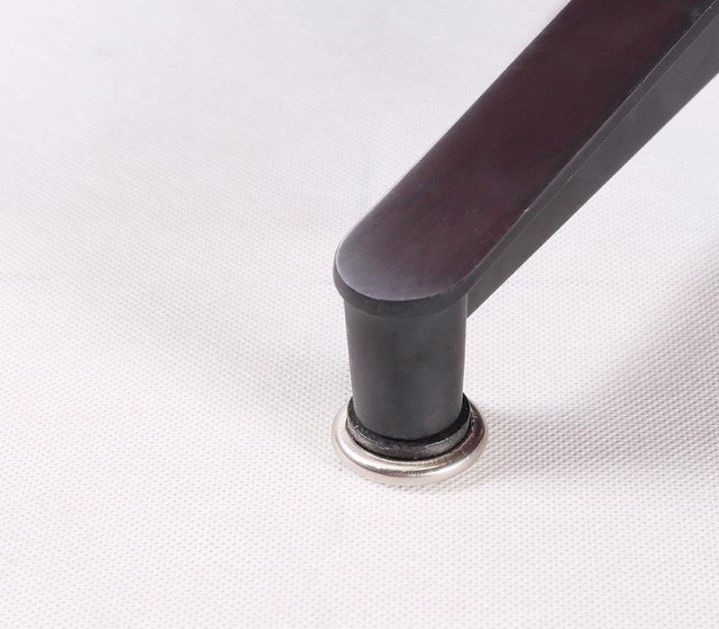 Polished aluminum base with black center column on an all black Eames lounge chair replica