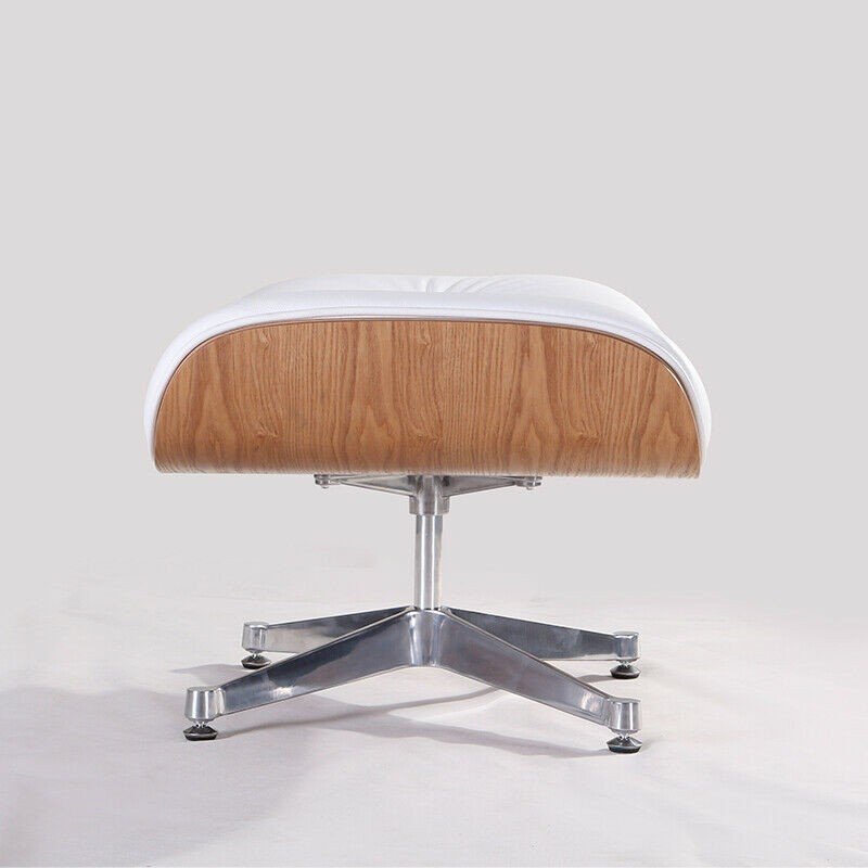 Standalone matching white leather ottoman footrest with a four-star chrome base.